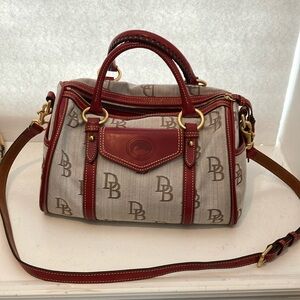 Dooney and Bourke barrel pocket satchel handbag. Red and brown. Preowned